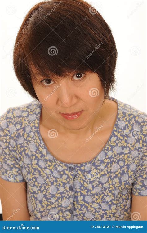 Shy Asian Woman Pictures, Images and Stock Photos